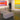 White Dash benches arranged in an art gallery in front of large paintings