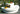 Demi-Stack half-round drum on a Moon Pad as tiered terrace seating with a tray of fruit