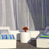 Pool Club Now cabana set in white vinyl: two chaise lounges, benches and a round ottoman with striped pillows under sheer curtains