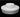 Studio view of a white Stack drum centered on a round Sun Pad against a black backdrop