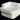 Chill White Stand ottoman with a Roll bolster resting on top as a corner back, studio view