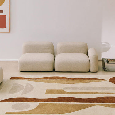 La Nuit recycled polyester rug, styled in a room