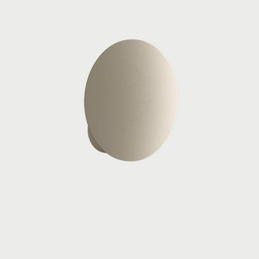 Italian-designed Lodes Puzzle Round Single matte champagne indirect LED wall light