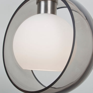 Close view of the Mana Smoke/Opal glass: opal globe inside a transparent outer ring | Besa Lighting