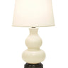 Stylish Marilyn Ivory on Black Cordless Lamp by Modern Lantern in a modern living room