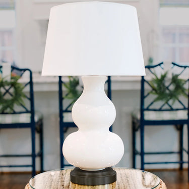 Marilyn Ivory on Black Cordless Lamp by Modern Lantern illuminating a cozy corner
