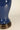 Midnight blue ceramic glaze with dark antique brass base on Elijah table lamp
