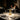 Mini Lara rechargeable cordless lamp providing ambient light on a restaurant table