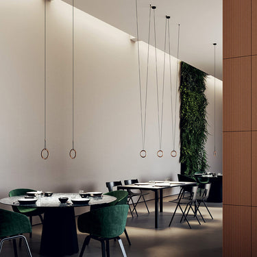 Matte champagne LED hanging light fixture with round canopy, ideal for modern interiors