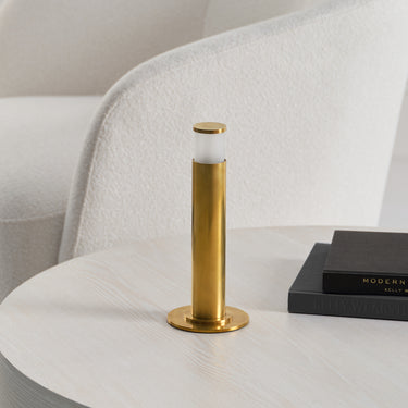 Portable dimmable lamp Miguel in rich antique brass, perfect for patio or living room.