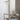 Moonbeam tea cup and pitcher on a brass side table | PILAR by Nina Thöming for blomus