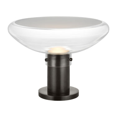 Modern mid-century style table lamp with clear glass shade and antique bronze base by Visual Comfort