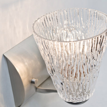 Nico 5 wall sconce, in a room | Besa Lighting