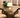 Vintage-inspired Oliver Cordless Table Lamp Antique Brass on a side table