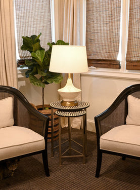 Vintage-inspired Oliver Cordless Table Lamp Antique Brass on a side table