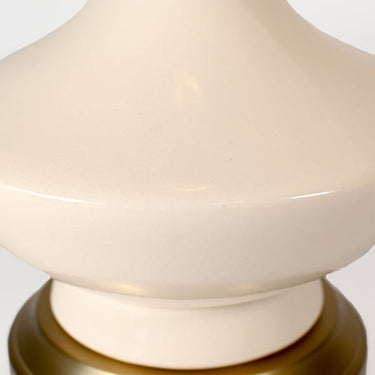 Antique Brass Oliver Cordless Table Lamp on a nightstand