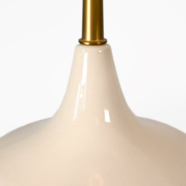 Oliver Cordless Table Lamp Antique Brass illuminating a living room