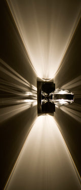 Optos wall sconce, lit | Besa Lighting