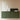 Elise table lamp by Pablo beside a green cabinet