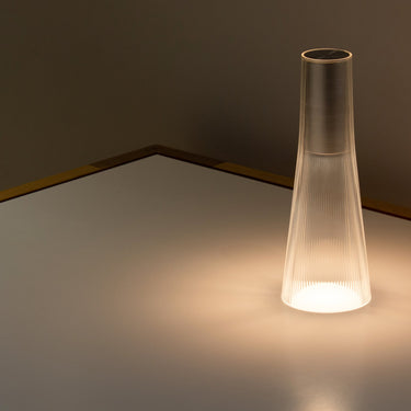 Silver Candél cordless lamp by Pablo, room view