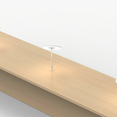 White Circa Grommet lamp by Pablo, angled view