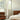 Elise floor lamp by Pablo in an Eames chair setting