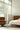 Elise floor lamp by Pablo in an Eames chair setting