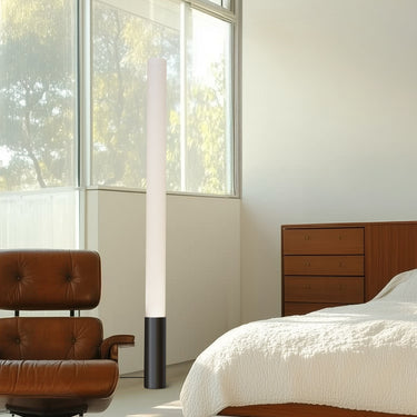 Black Elise floor lamp by Pablo in an Eames chair setting