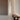 Elise floor lamp by Pablo beside a walnut bench