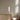 Elise table lamp by Pablo beside an oak cabinet