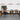 Sky Dome walnut wood pendant by Pablo over a walnut dining table