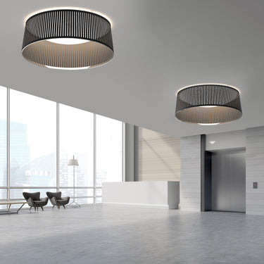 Solis Drum flush mount by Pablo in a lobby