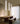 Solis Flush by Pablo over a walnut dining table