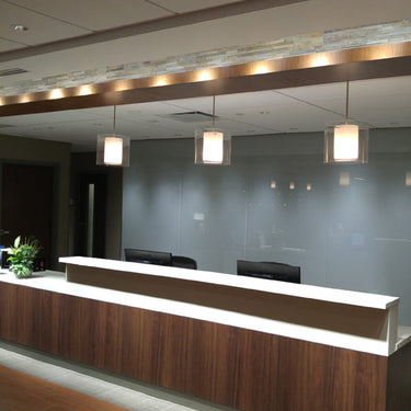 Pahu 12 in a reception area, Clear glass | Besa Lighting