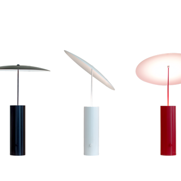 Table lamp, the shade tilted three ways | Parasol by Innermost