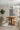 Graypants Loci Ring 48 chandelier hanging over a dining table