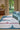 Pygmée wool rug, styled in a room