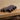Hippo Rattle by Eguchi Toys, close-up of the walnut grain