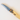 Curved edge of the small paring knife up close