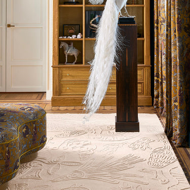 Sabbia wool rug in White, styled in a room