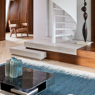 Saona jute rug in Blue, styled in a room