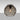 Bombay Smoke globe glowing, showing the circular optic pattern | Besa Lighting