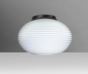Pape 10 in Opal Ribbed glowing on the ceiling | Besa Lighting