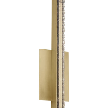 Visual Comfort Serre small sconce mounted vertically in a contemporary bathroom vanity setting in Natural Brass