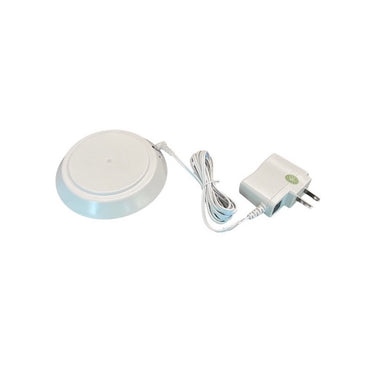 Smart & Green BULBLITE charger, round white charging pad with cable and plug, on a white background