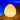 Smart & Green Rocky lamp glowing warm yellow at dusk beside the water