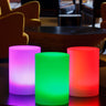 Smart & Green Tower XXS cylinder lamps glowing pink, green and red
