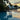 Smart & Green Globe lamp reflected in a villa pool at sunset