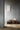 White Coated Paper in a bookcase, lit | ST906 Mini Table Lamp by Tom Rossau