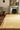 Syracuse wool rug in Yellow, styled in a room